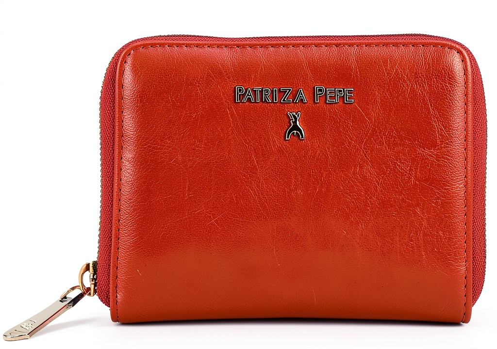 Womens faux leather bag with zipper closure on a table